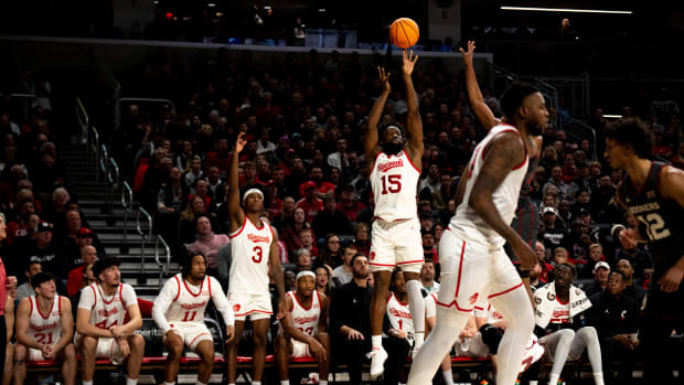 Cincinnati Bearcats guard John Newman III (15) hits a 3-point basket in the second half of the NCAA basketball game between Cincinnati Bearcats and Oklahoma Sooners at Fifth Third Arena in Cincinnati on Saturday, Jan. 20, 2024.